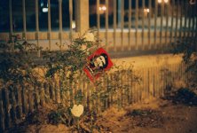 a flyer stuck in the bushes near the university.jpg